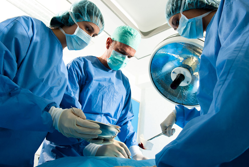 Successful neurosurgery patient with care team